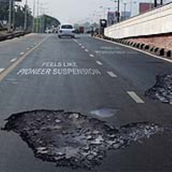 An on-road advert shows how smooth the suspensions are