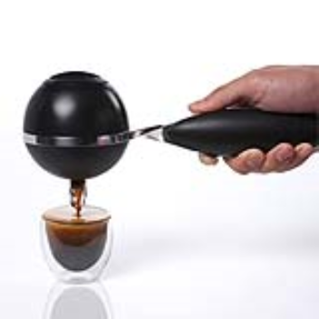 Portable handheld device for making espresso