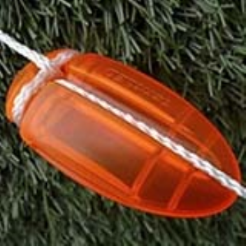 In plastic encased LED light that can be tied on to the tent ropes with a knot