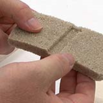 Construction material which hardens quickly and is stronger than concrete