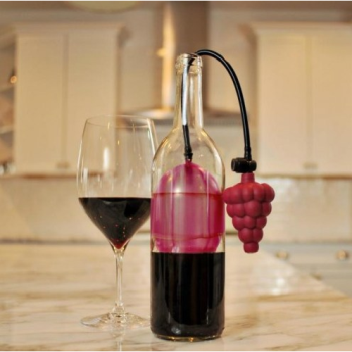 The Air Cork is a device that keeps wine fresh by sealing it with a balloon-like bladder