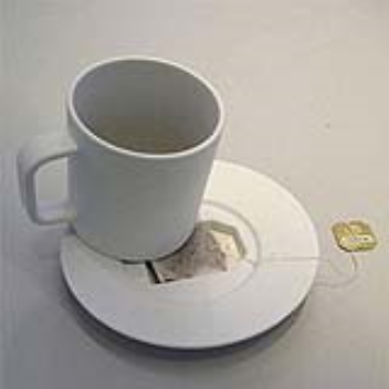 Place in a saucer to hold the tea bag under the cup