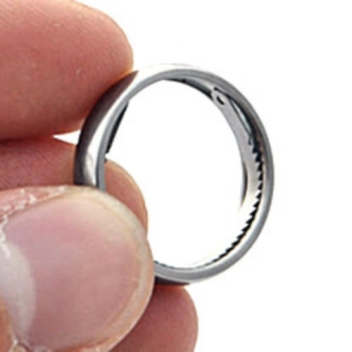 This ring contains a saw and handcuff shim pick combination tool