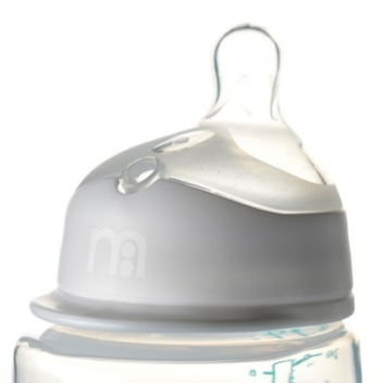 Baby bottle with off-centre teat