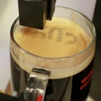 Espresso machine can print text messages on coffee foam with edible ink