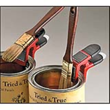 Holder that stops your paintbrush falling into the can