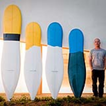 Tapered surfboard adds maneuverability of the shortboard to the longboard