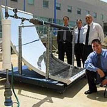 Solar icemaker that uses a liquid that evaporates when exposed to the sun and drops below freezing when its dark